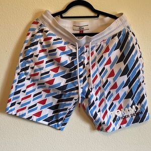Red, light blue, and navy Tommy Hilfiger Denim sweat shorts